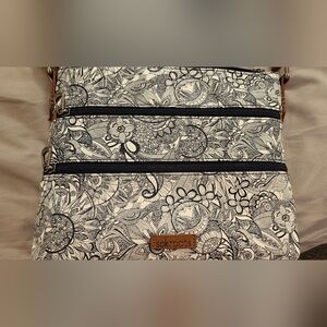 Sakroots Intricate Blue and Cream Floral Bag